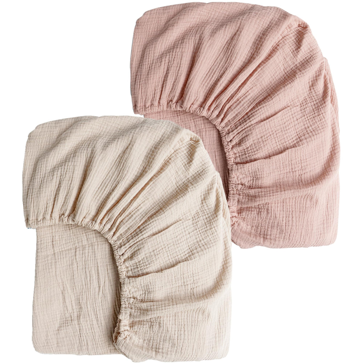 Konssy muslin crib sheets in pink and cream stay soft and colorfast after washes.