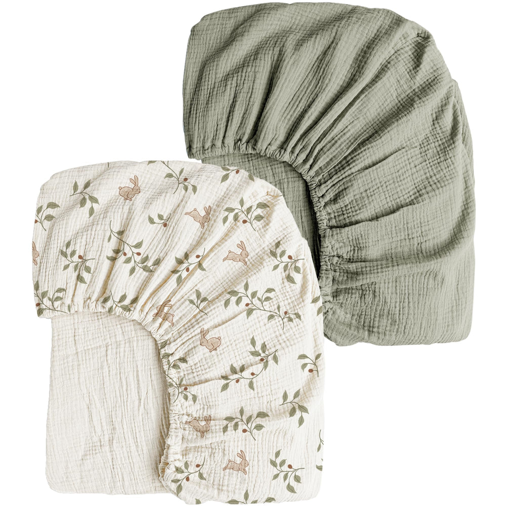 Konssy muslin crib sheets with rabbit print in fog green for breathable baby comfort.