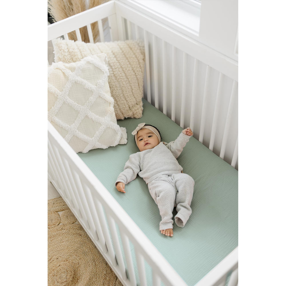 Konssy muslin crib sheets stretch-fit elastic ensures snug mattress.