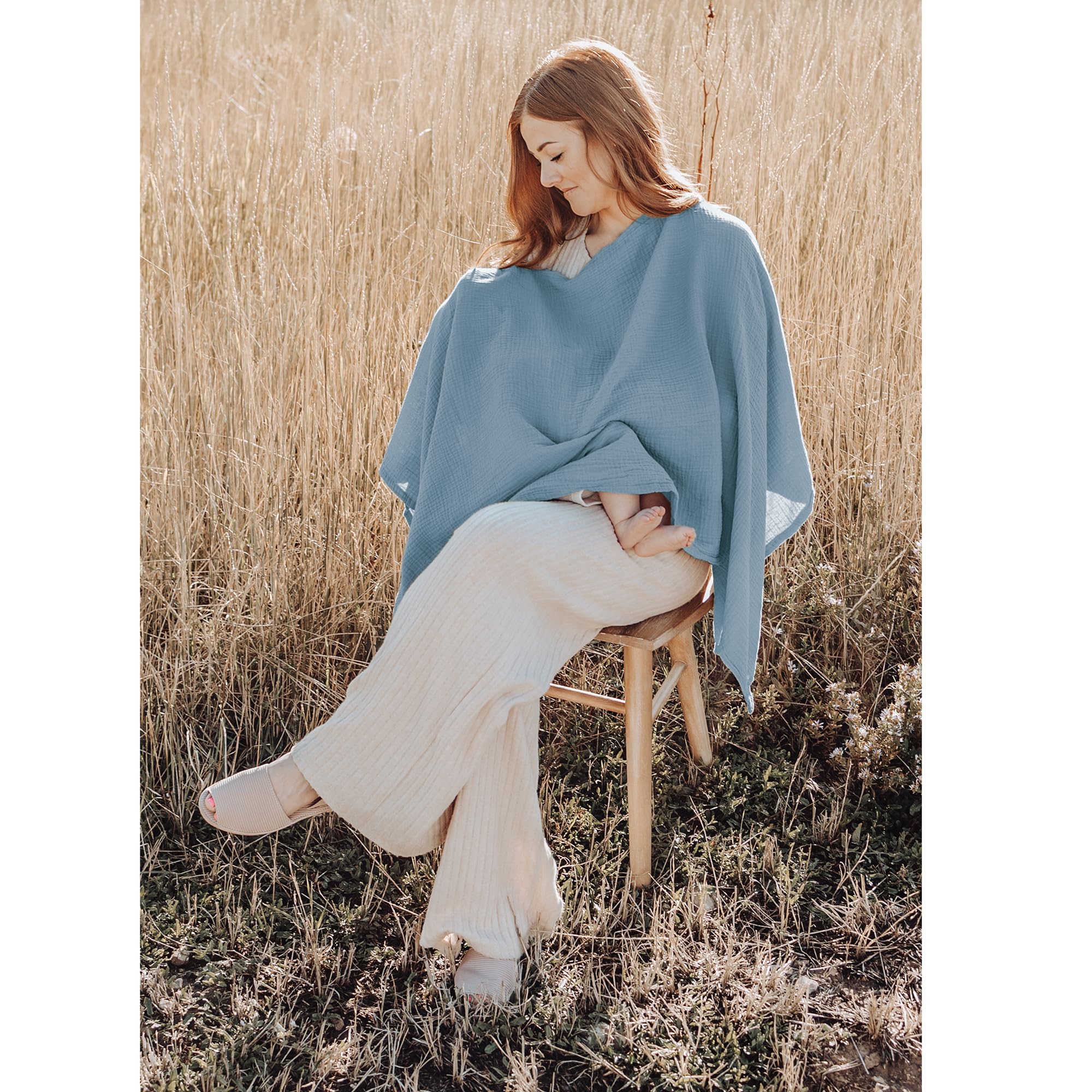 Konssy nursing cover on car seat offers shade and protection.