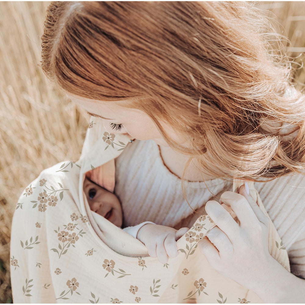 Konssy nursing cover with rigid hoop promotes airflow and easy baby visibility.