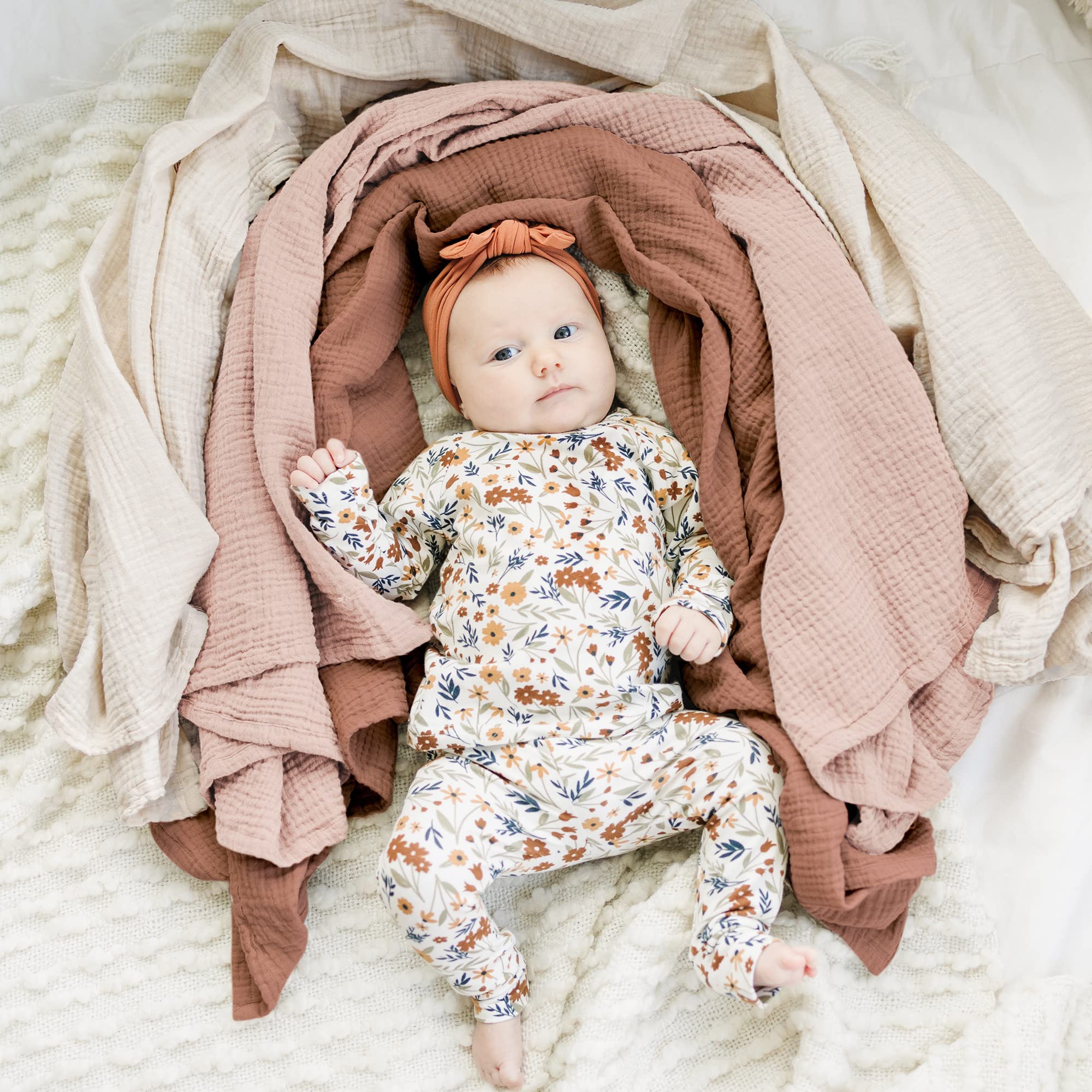 Konssy muslin swaddle blanket 47x47 inches—large wrap for secure swaddling.