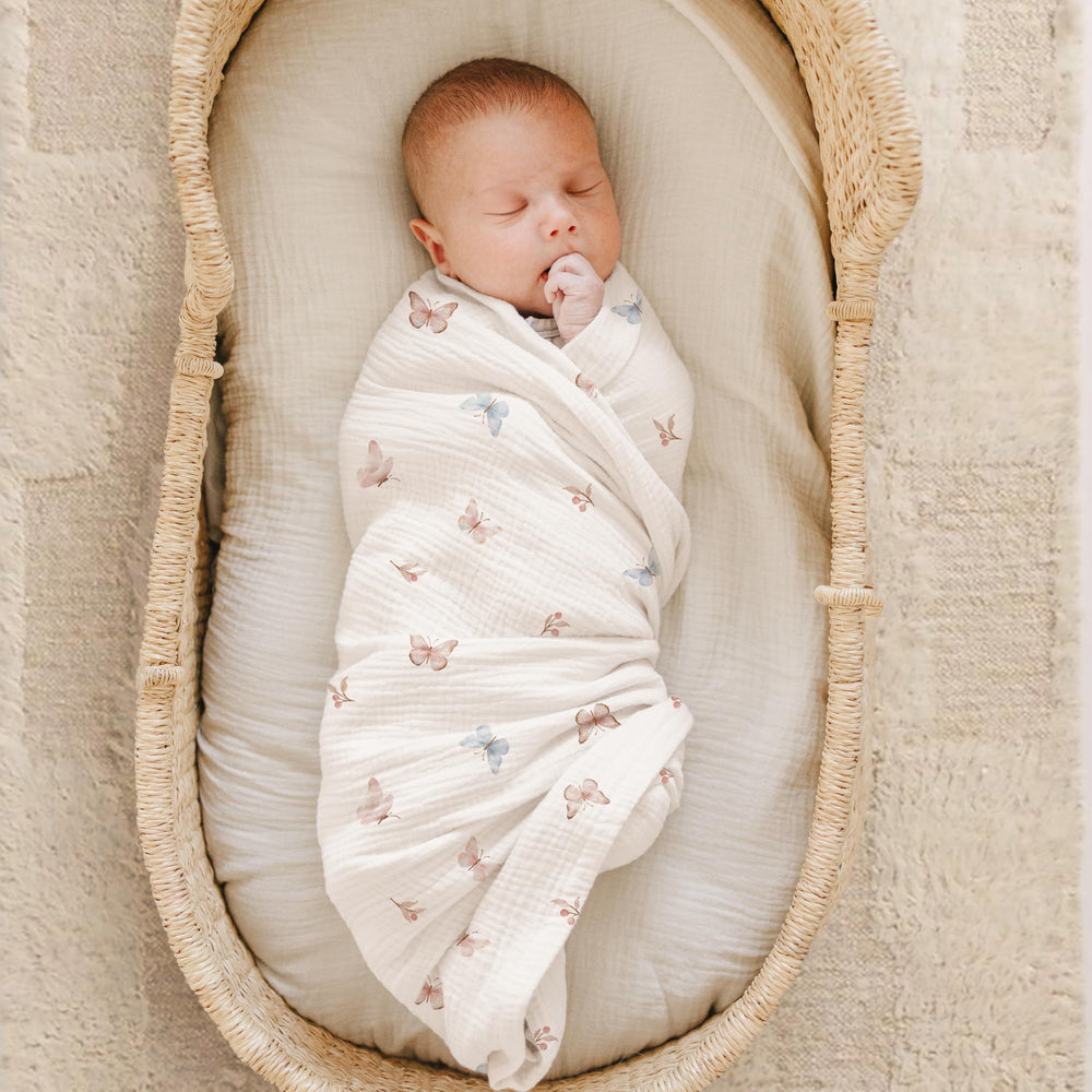Konssy muslin swaddle blanket 47x47 inches for secure wrapping