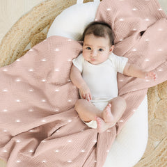 Konssy muslin swaddle blanket with khaki leaf pattern adds versatile color