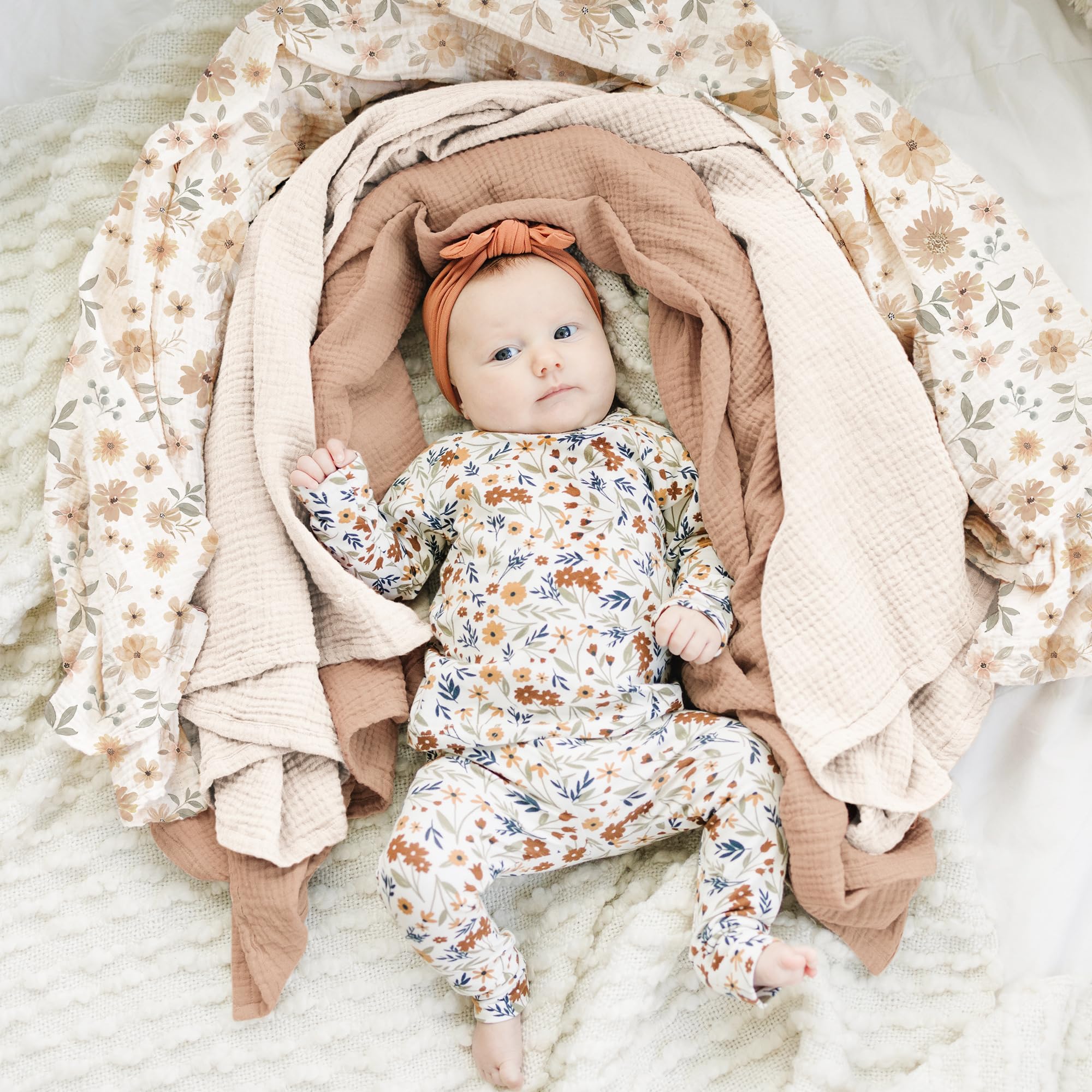 Konssy muslin swaddle blanket folded to reveal 47x47 inch large size