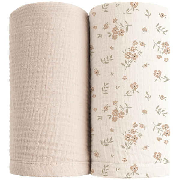 Konssy muslin swaddle blanket in soft cream for newborns, breathable and gentle.
