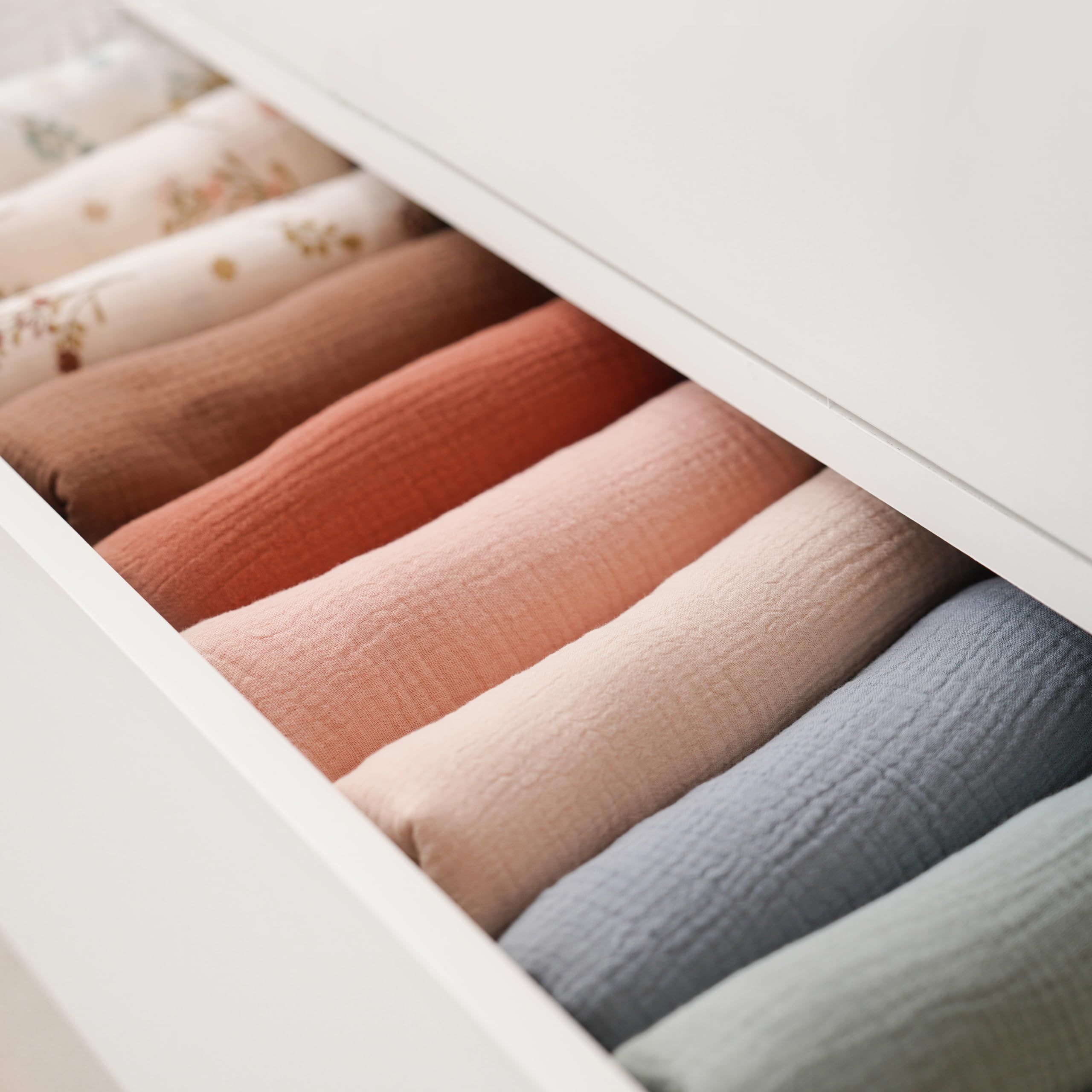 Konssy swaddle used as nursing cover or stroller shade.