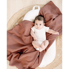 Konssy muslin swaddle large forty-seven-by-forty-seven closeup: wraps securely for newborn comfort.