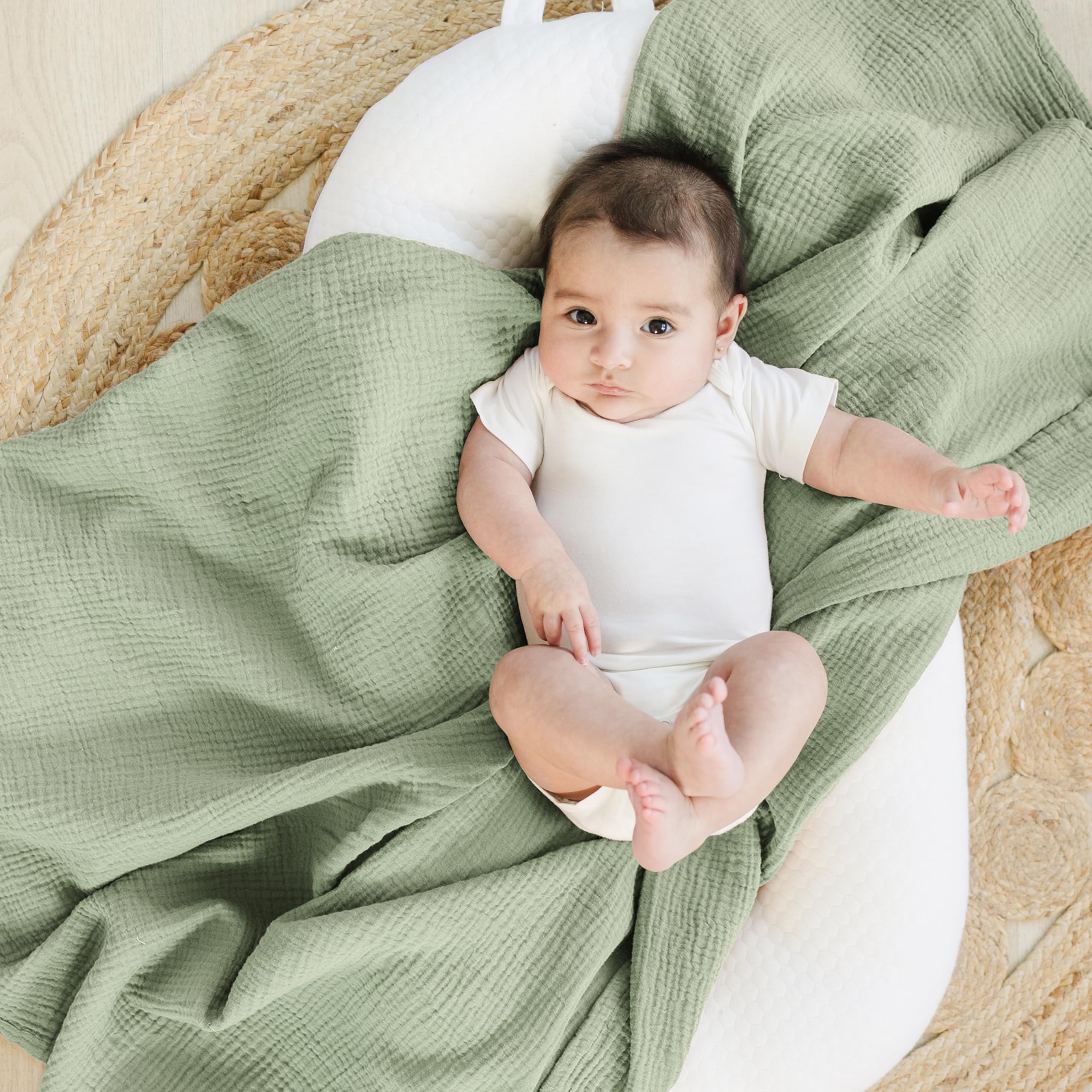 Two-pack Konssy swaddles in Woodland Sage for versatile newborn wrapping.