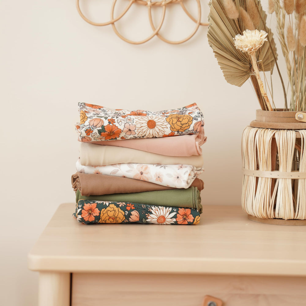 Konssy blanket draped for a car seat cover during travel