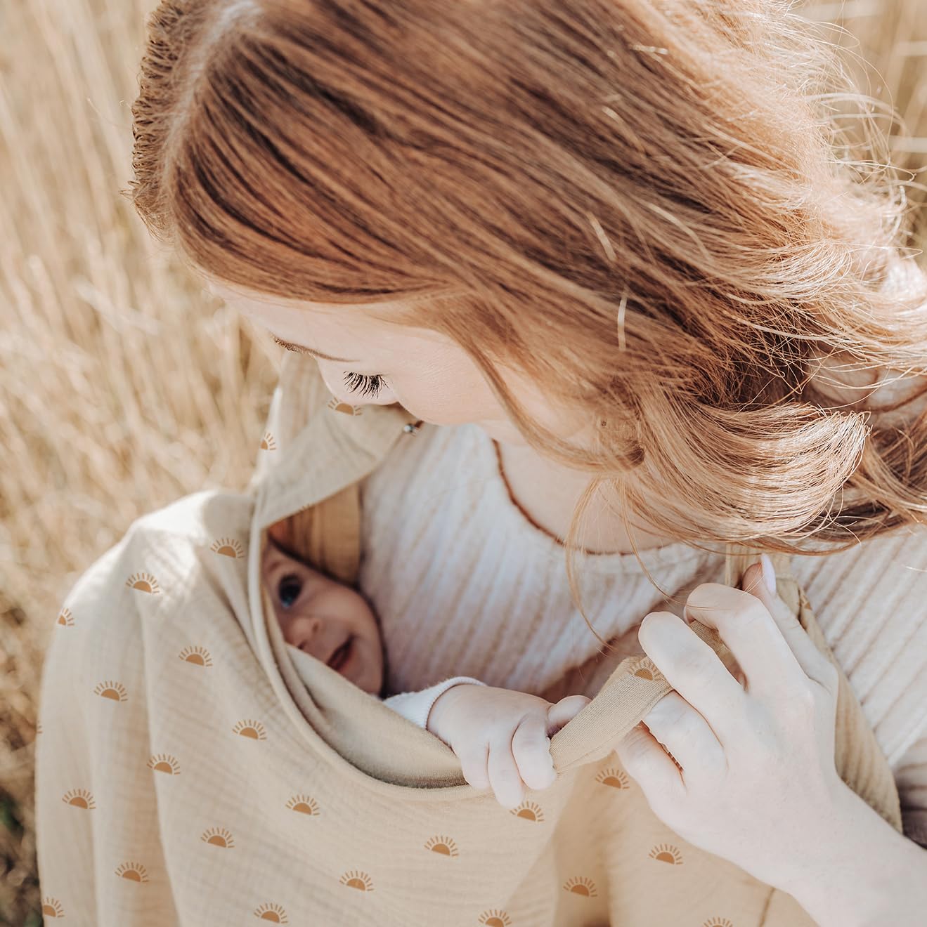 Konssy nursing cover with rigid hoop for airflow and visibility.