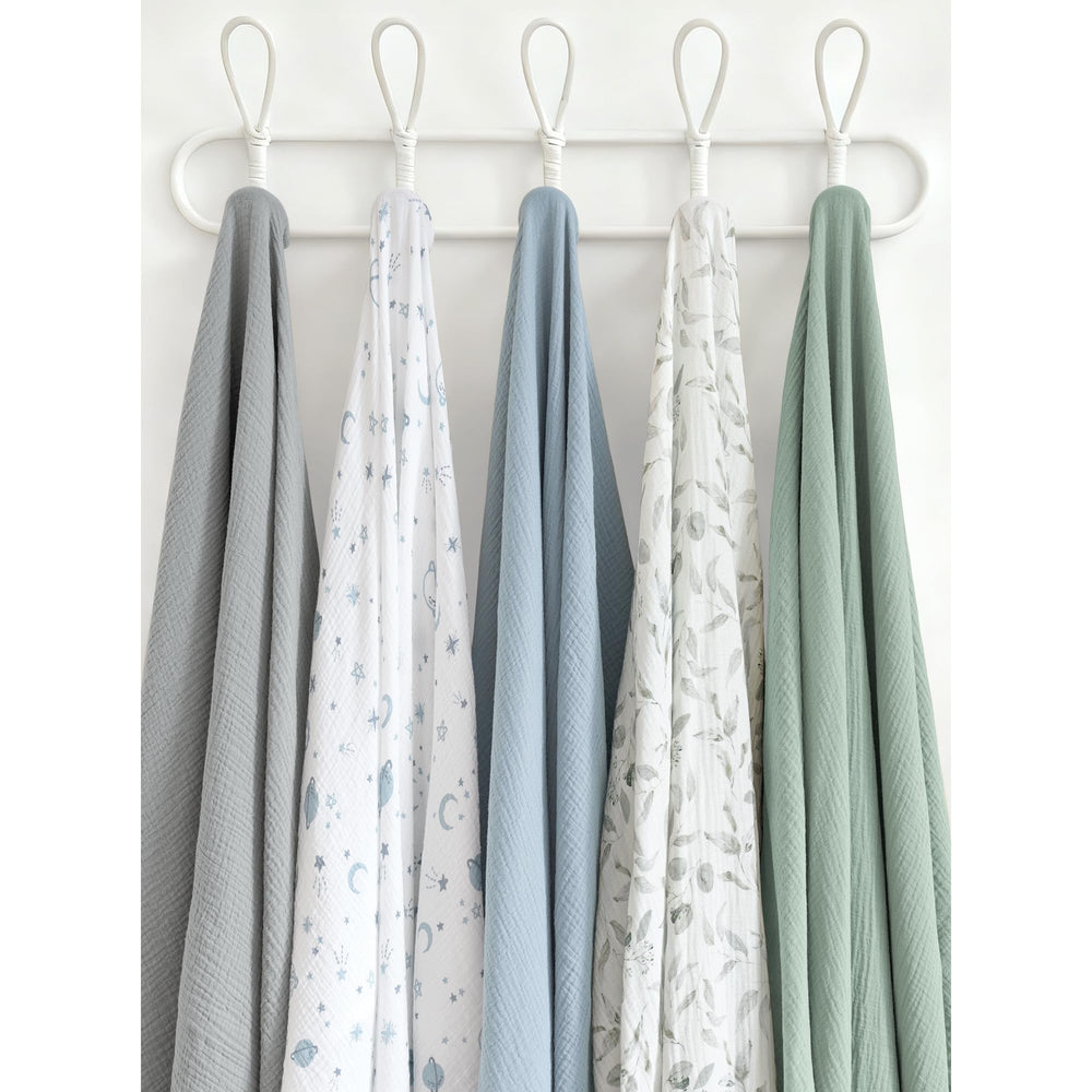 Konssy swaddle blanket offered as multi-use prop, cover, or shade.