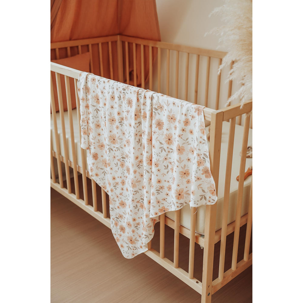 Konssy swaddle used as a nursing cover in daily use