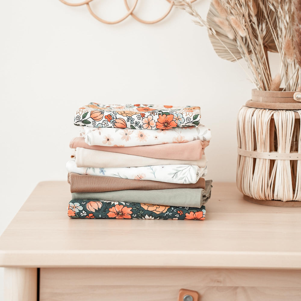 Konssy swaddle used as nursing cover for discreet feeding.