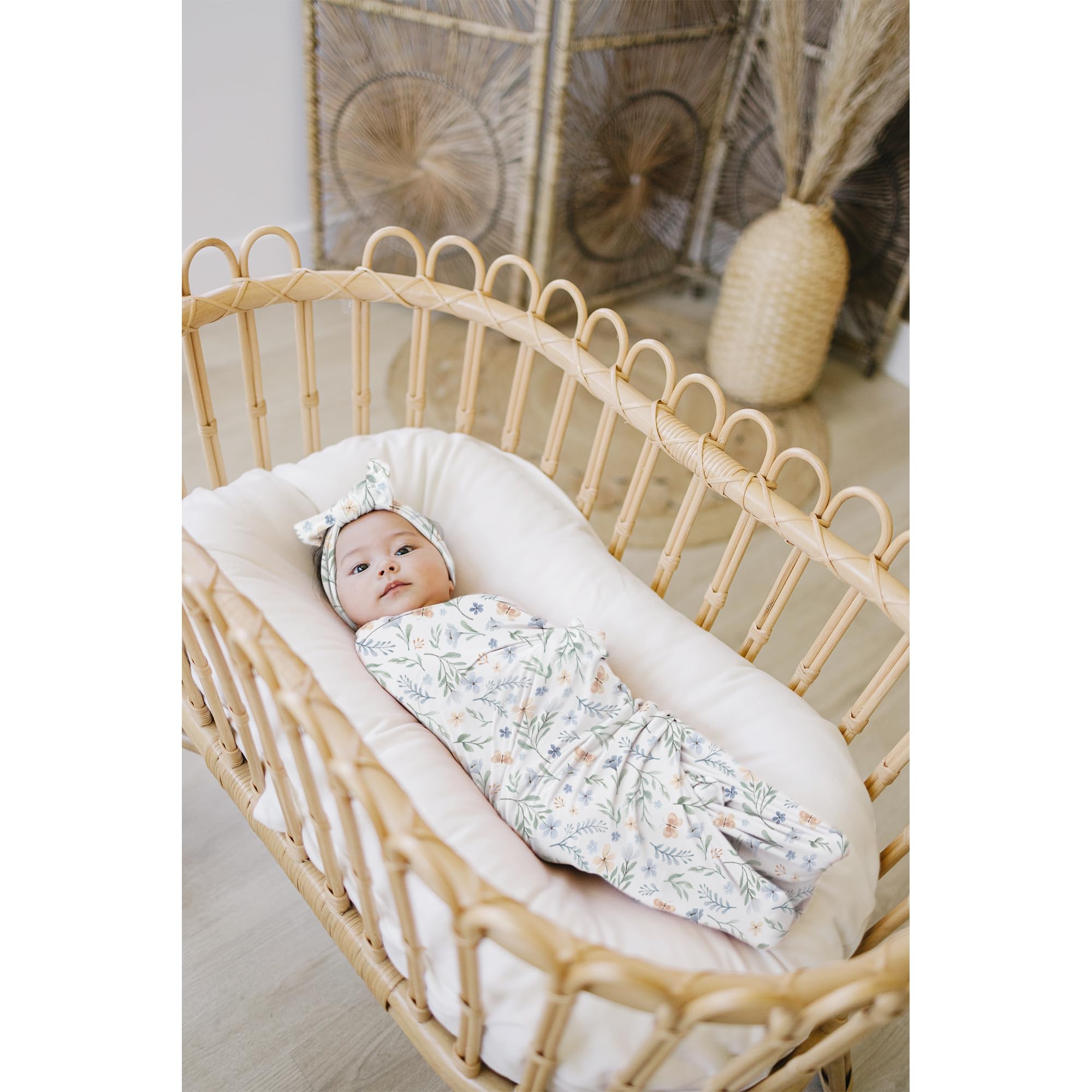 Konssy swaddle for nursing or stroller cover versatility.