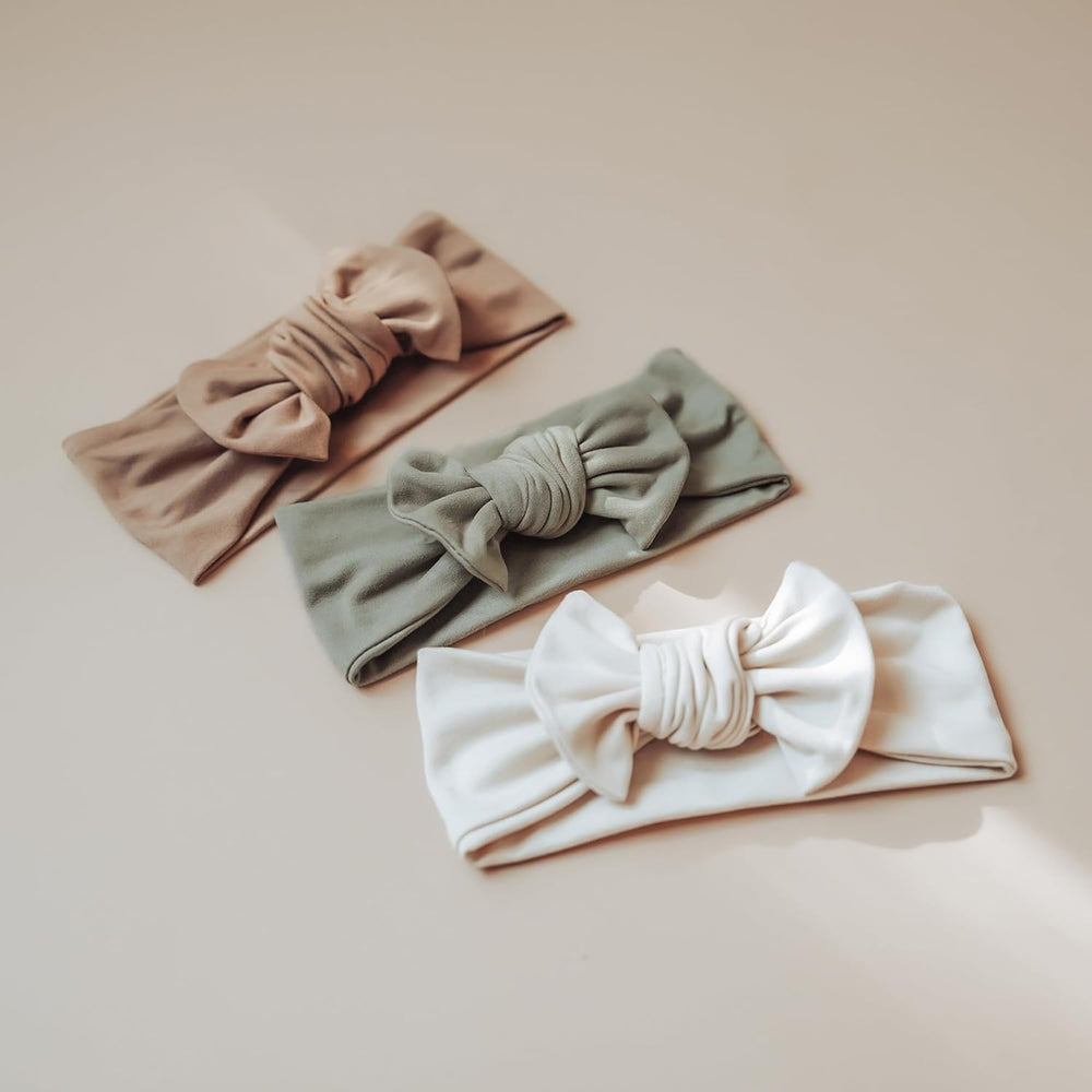 Konssy swaddle photoshoot moment highlights adorable newborn styling