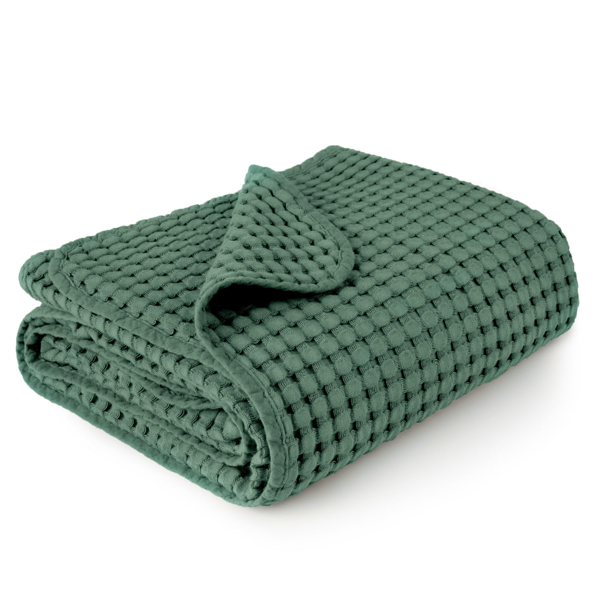 Konssy waffle baby blanket folded, a cozy nursery essential.