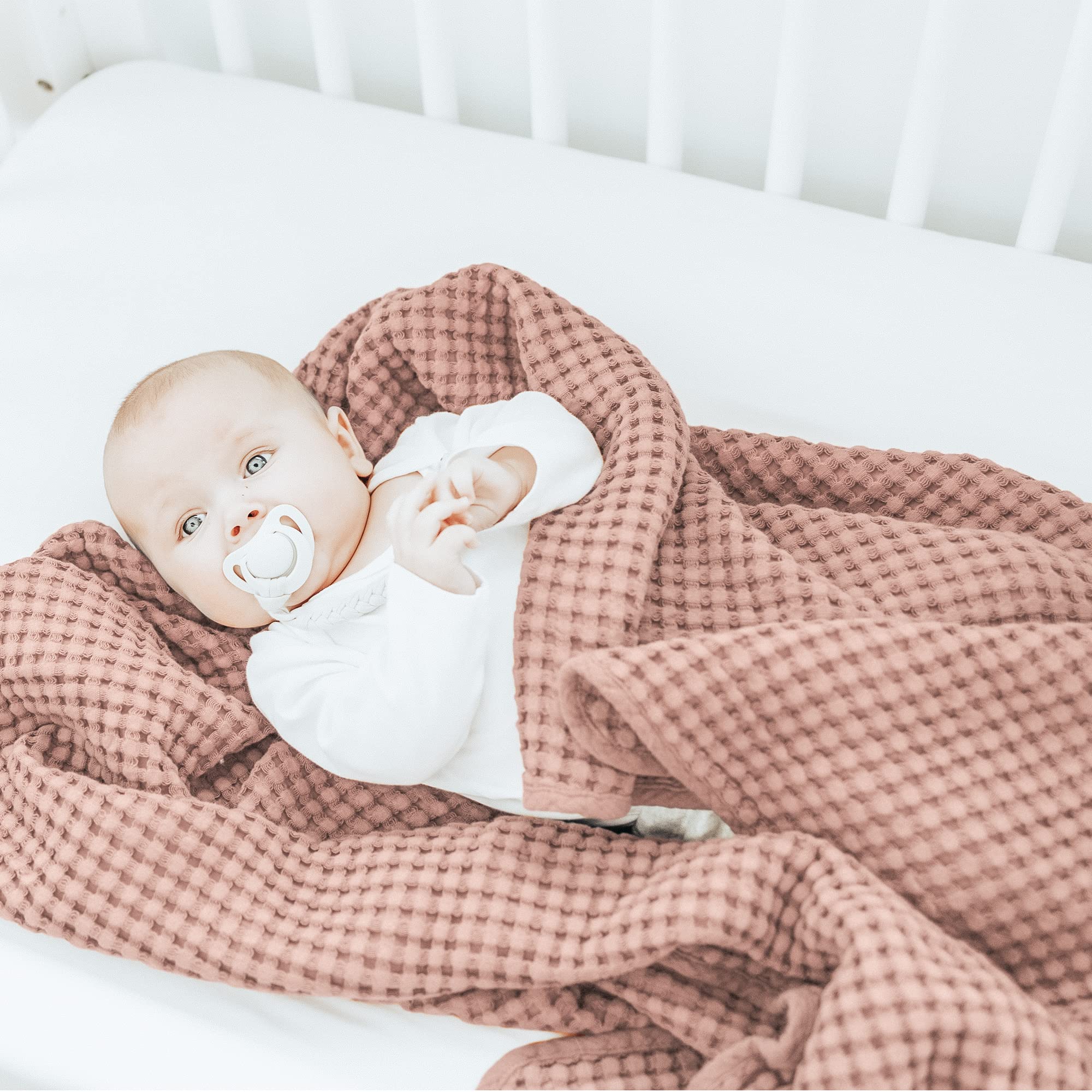 Konssy waffle blanket doubles as crib throw and photography prop.