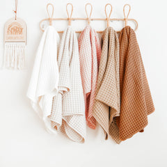 Konssy Waffle Baby Blanket pink in stroller, lightweight comfort on outings.