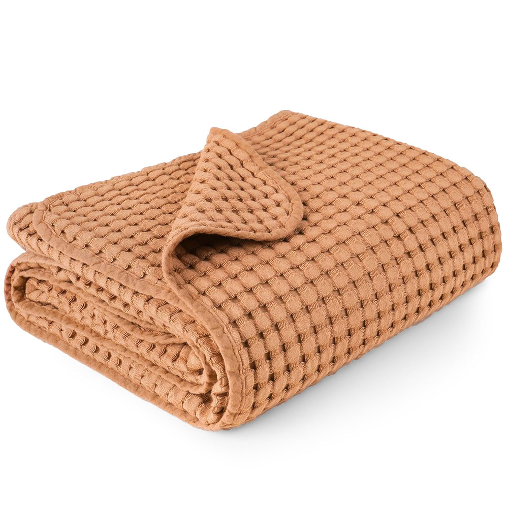 Konssy waffle blanket texture close up shows warm breathable fabric for baby comfort
