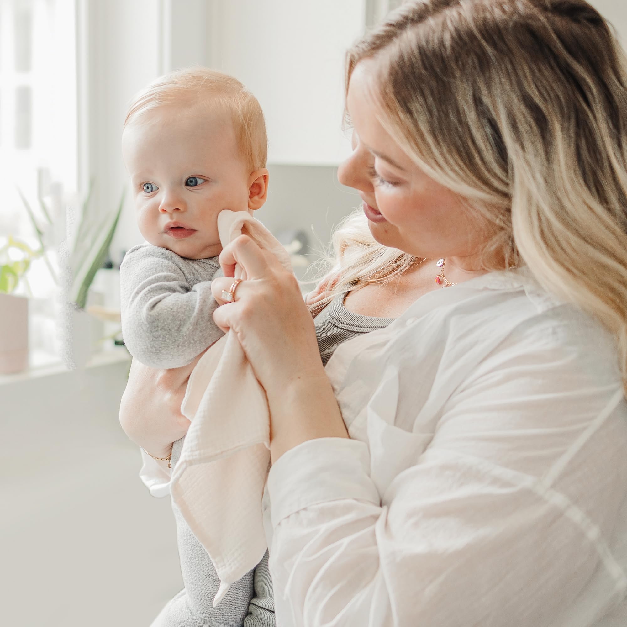 Konssy washcloth doubles as burp cloth for on-the-go cleanup.