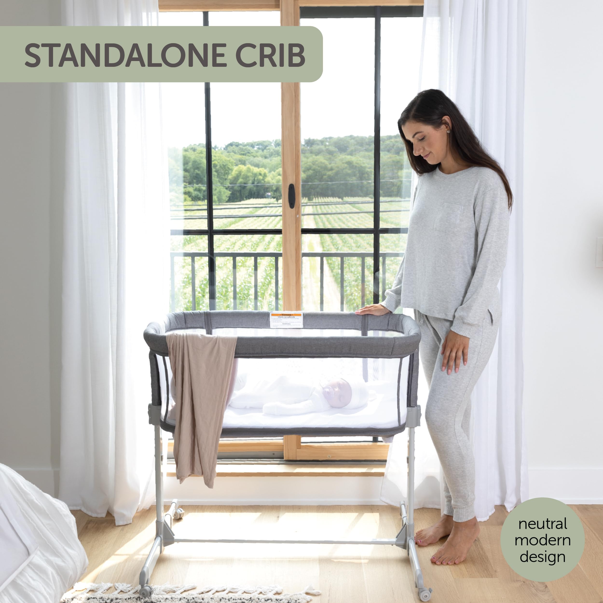 KoolerThings adjustable-height bassinet set to bed-height level.