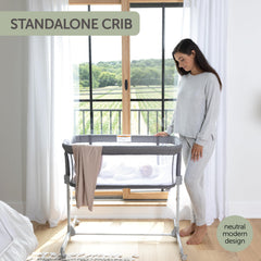 KoolerThings adjustable-height bassinet set to bed-height level.