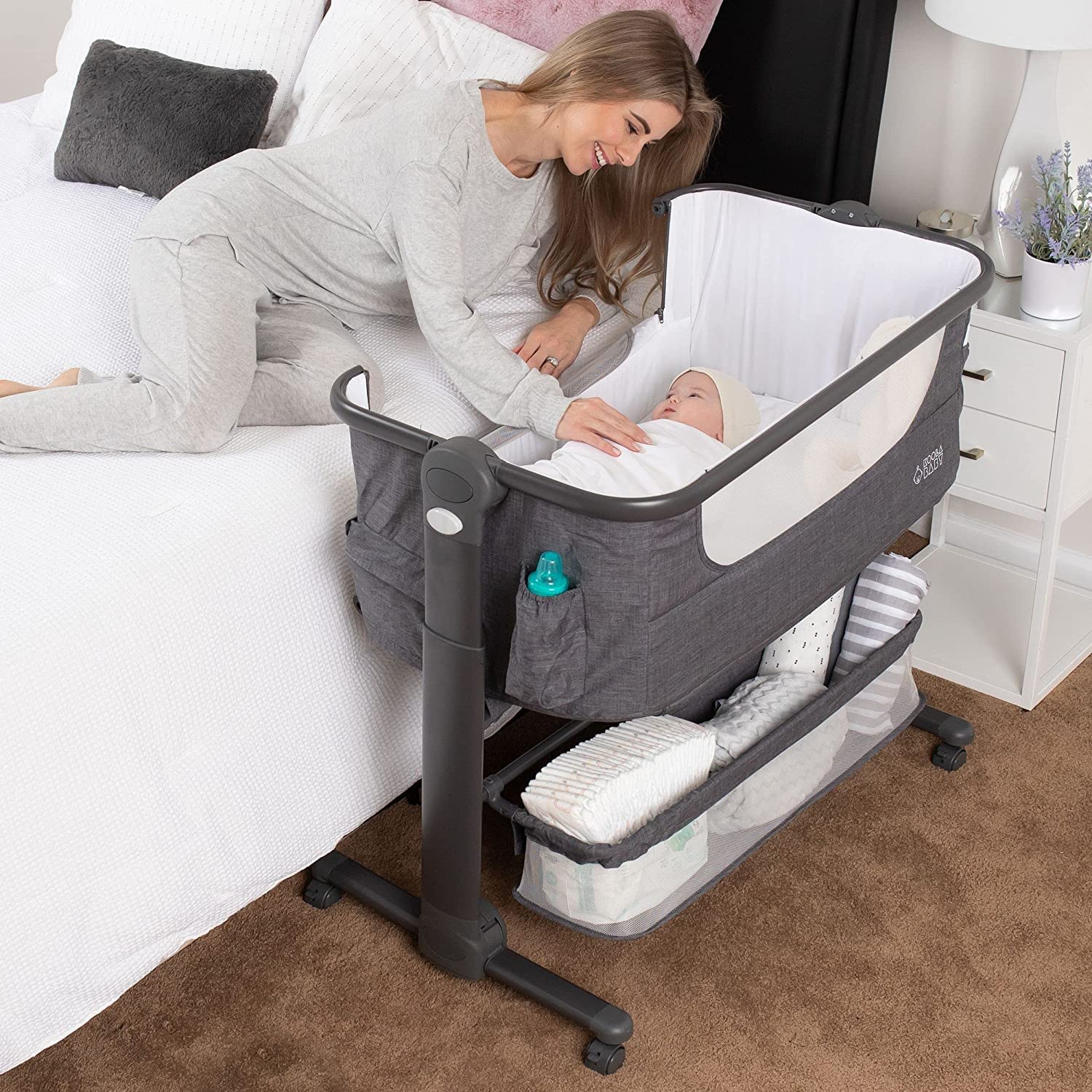 KoolerThings baby bassinet beside-bed setup for easy nighttime feeds.