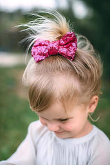 Koolgil photography shot royal blue bow clip adds sparkle to outfits.