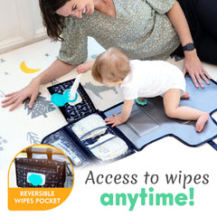 Kopi Baby changing mat with stroller attachment Velcro straps for convenient travel use.