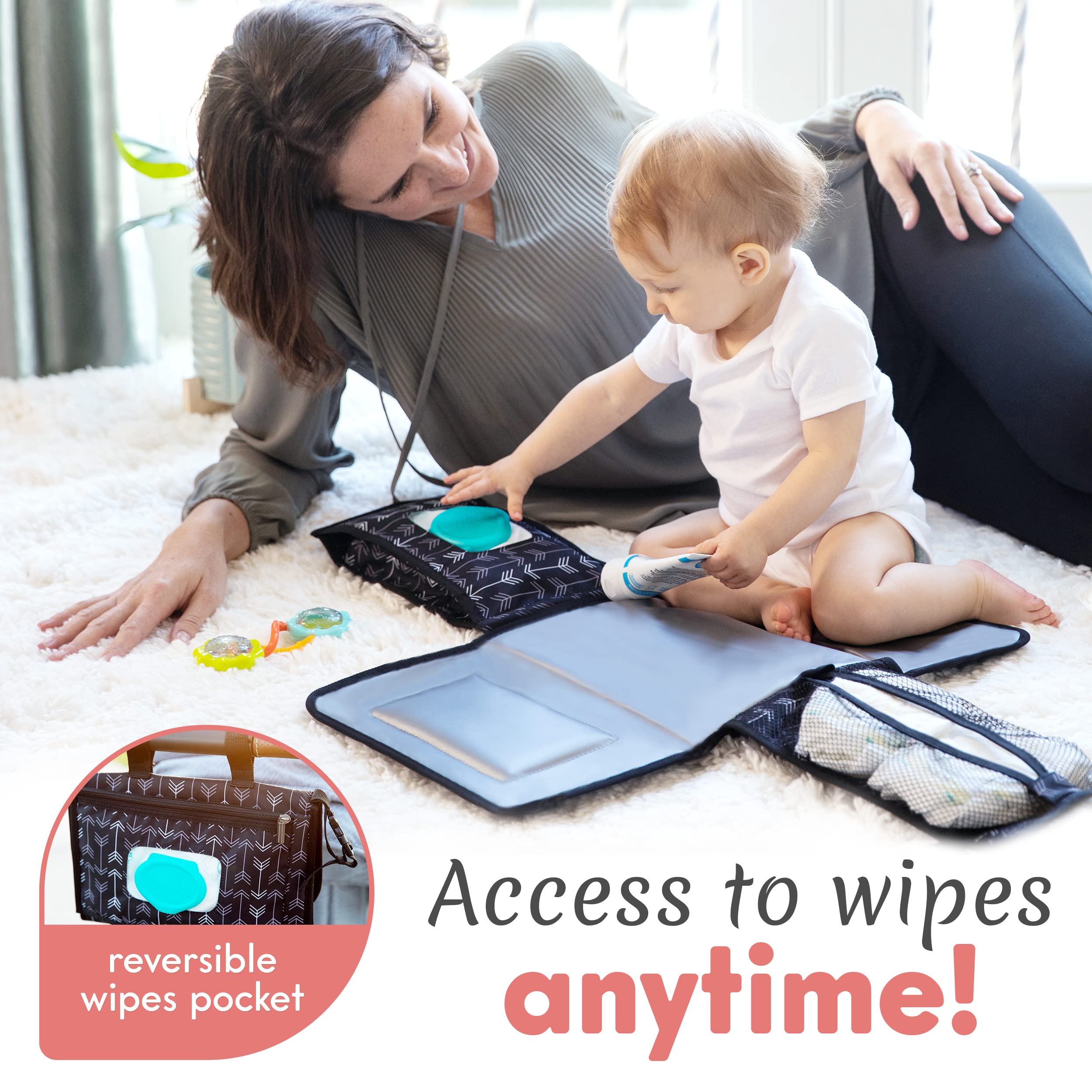 Kopi Baby changing pad featuring a front zipper pocket for essentials.