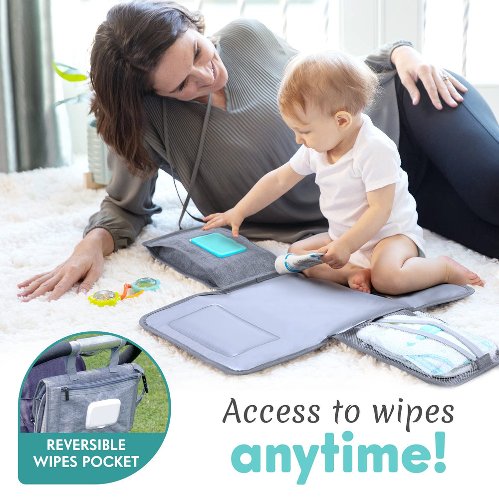 Kopi Baby changing pad attached to stroller with Velcro straps