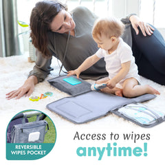 Kopi Baby changing pad attached to stroller with Velcro straps