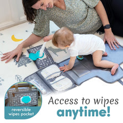 Kopi Baby changing pad attached to a stroller with Velcro straps