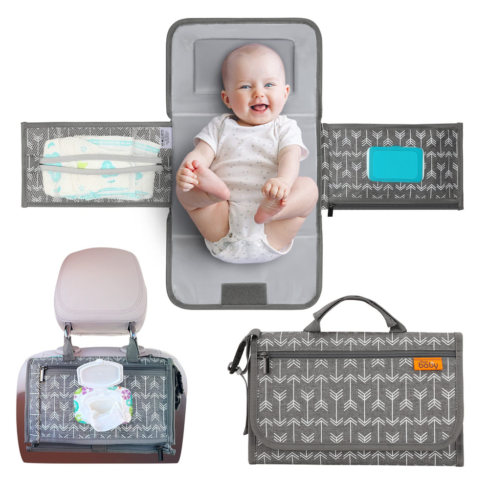 Kopi Baby portable diaper changing pad with built-in pillow offers soft on-the-go comfort