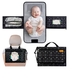 Kopi Baby portable diaper changing pad opened for on-the-go diaper changes.