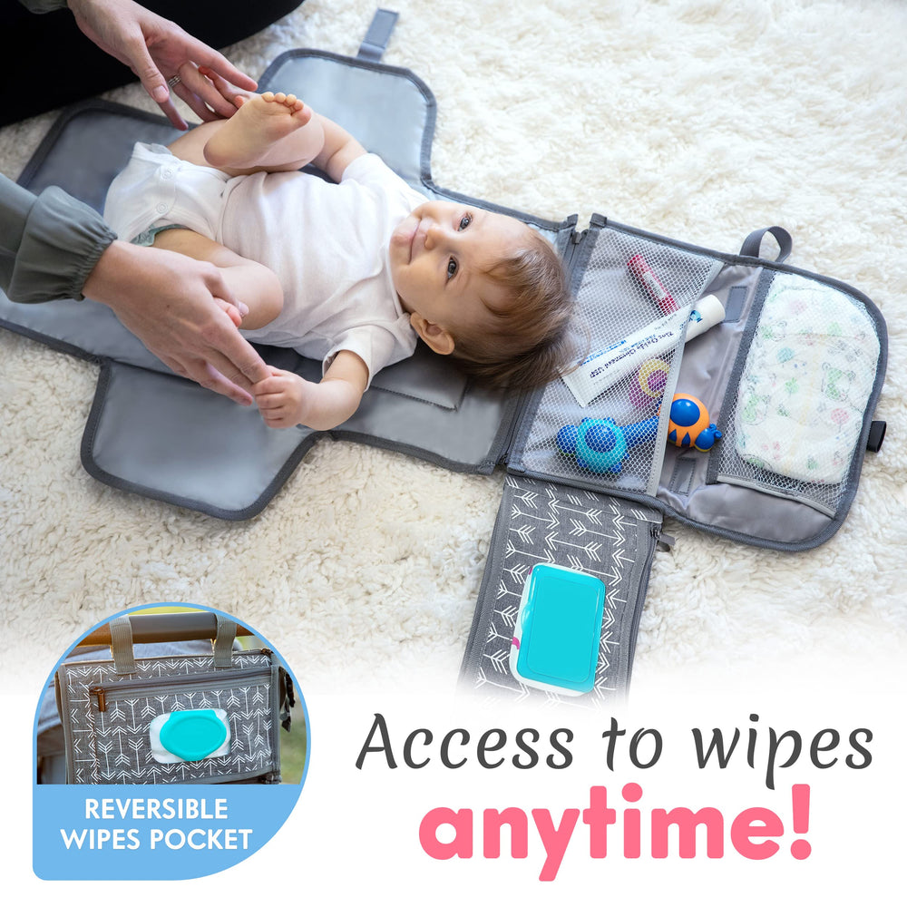 Kopi Baby stroller attachment with Velcro straps keeps pad secure.