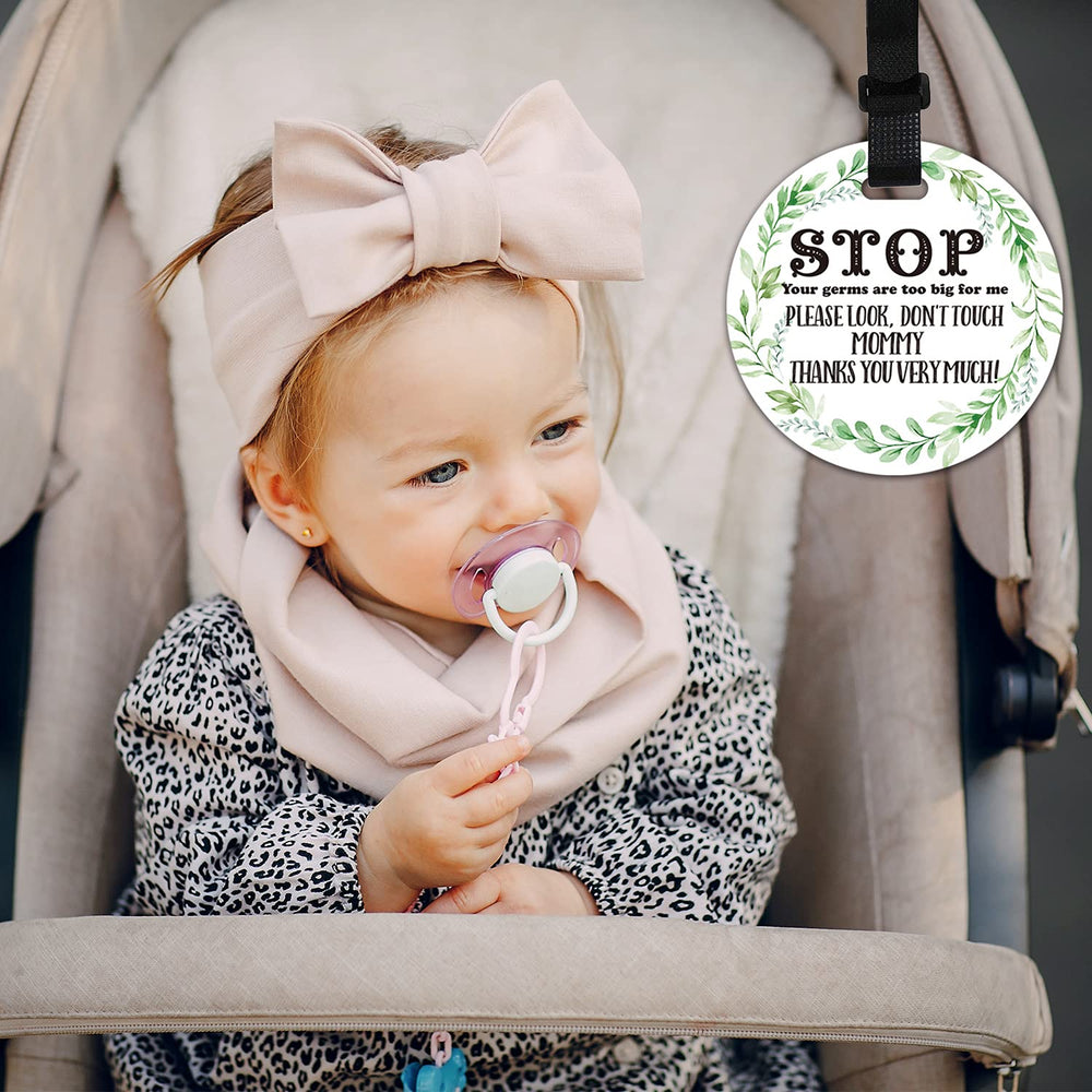 KORTTITALO baby safety sign close-up clip demonstrates easy attachment and visibility