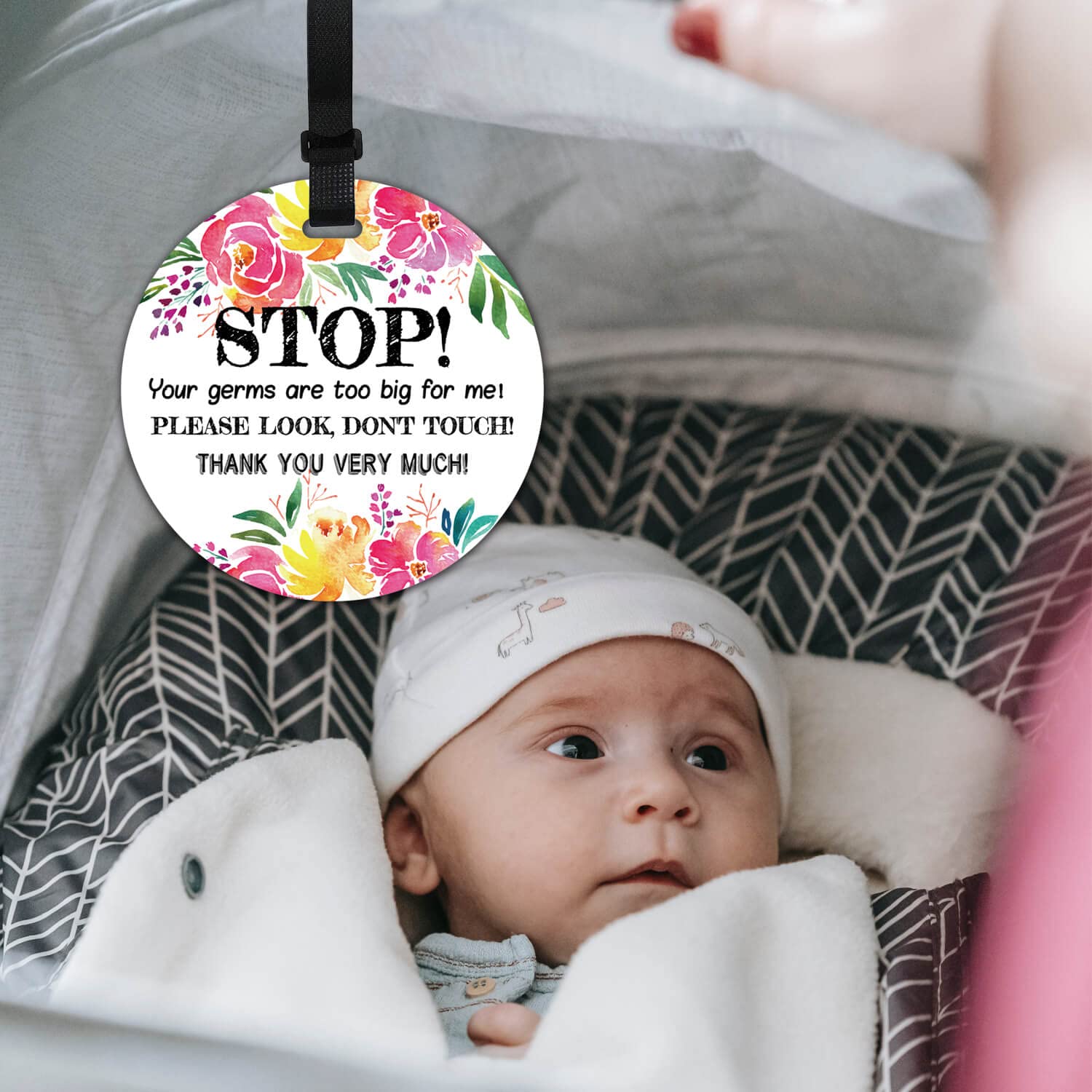 KORTTITALO stroller tag clip-mount shown for quick, secure attachment.