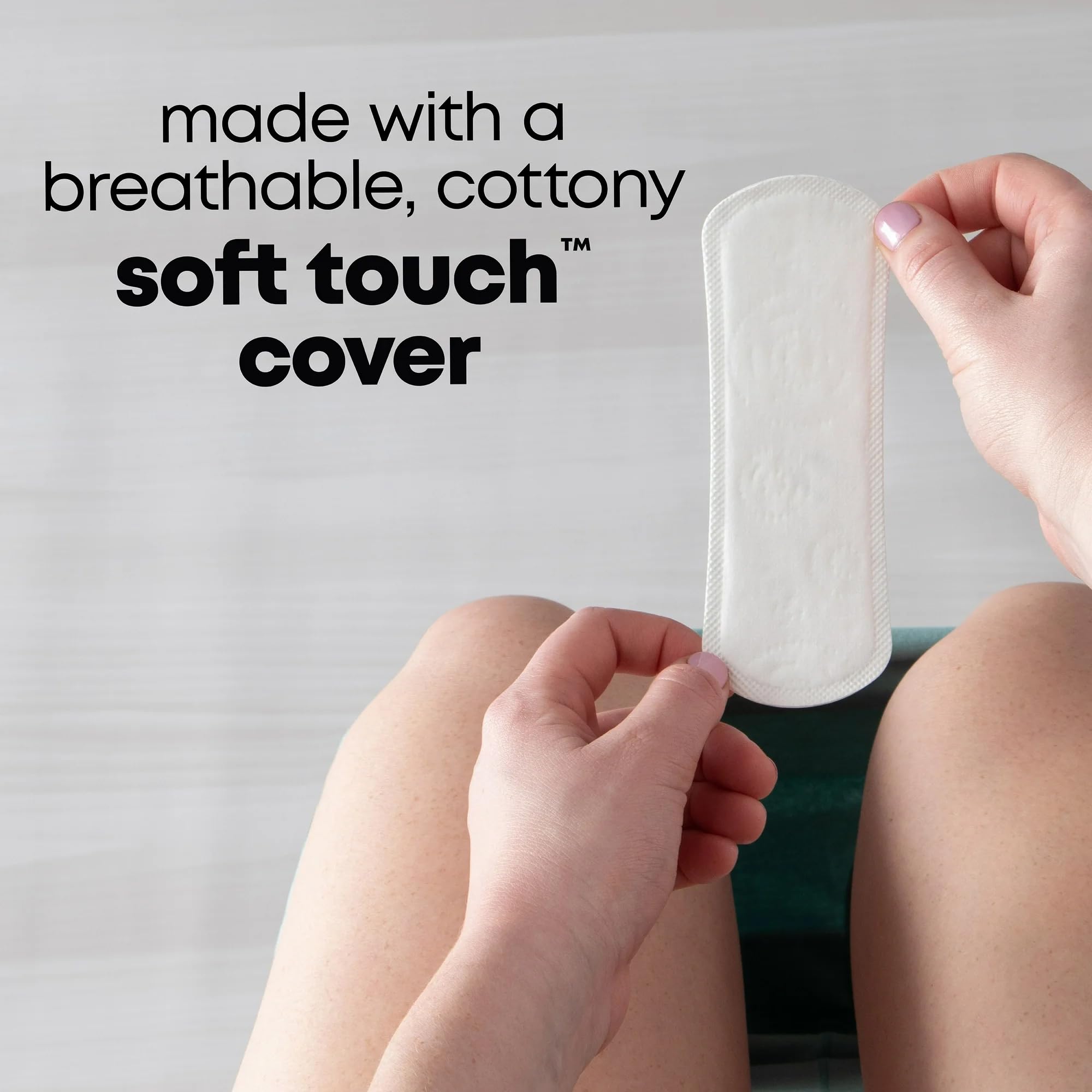 Kotex Lightdays Liners Regular quick-dry touch suggesting freshness on busy days.