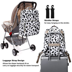 Kouxunt cow print diaper bag laptop compartment fits a 15.6 inch device.