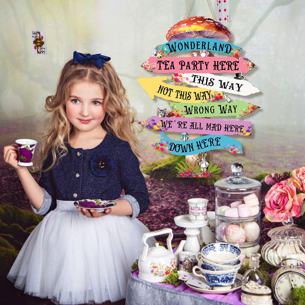 KOYILTD Alice Wonderland directional arrows guide guests with whimsy