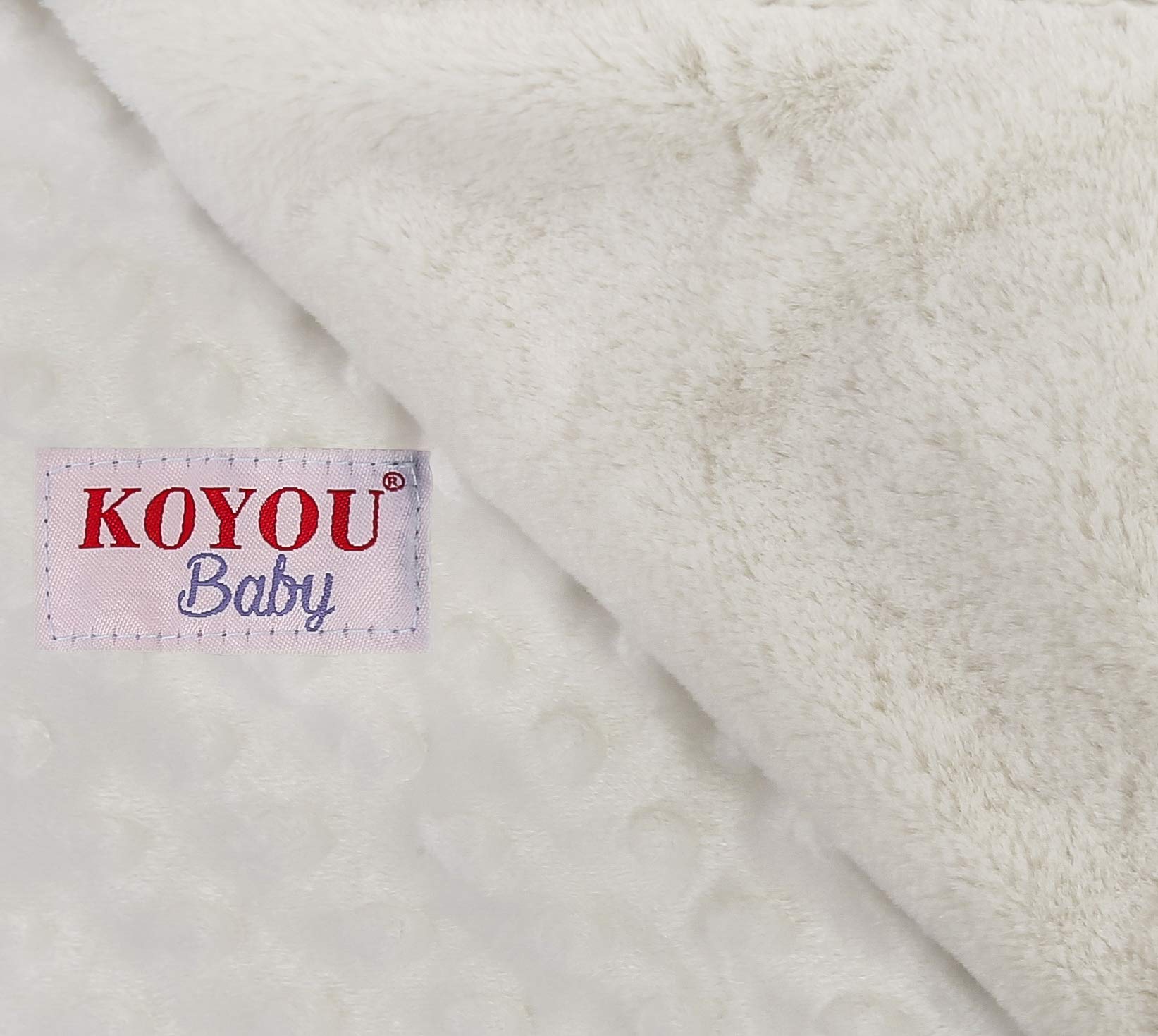 KOYOU Baby blanket satin trim side close-up showing silky edge.