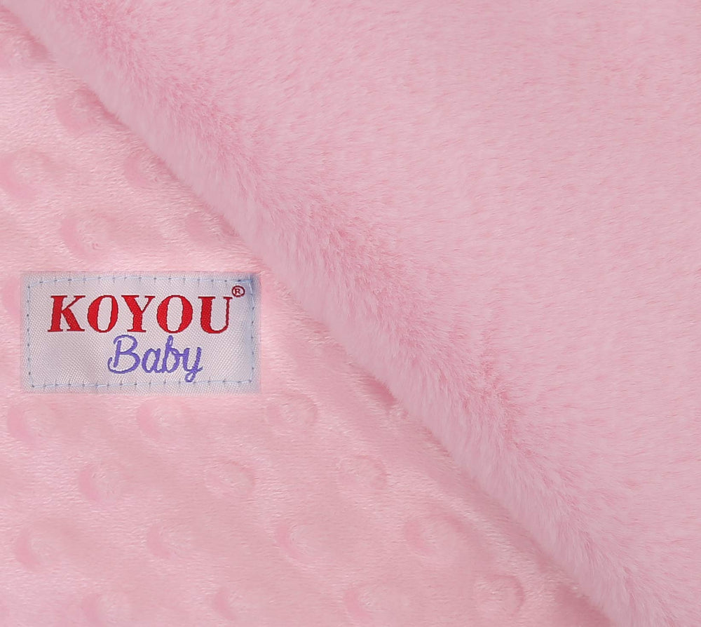 KOYOU Baby Pink blanket with dotted backing supports sensory exploration.