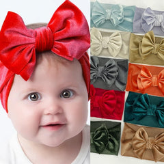 Kryoflare stretchy baby headband soft velvet stays secure but comfortable.