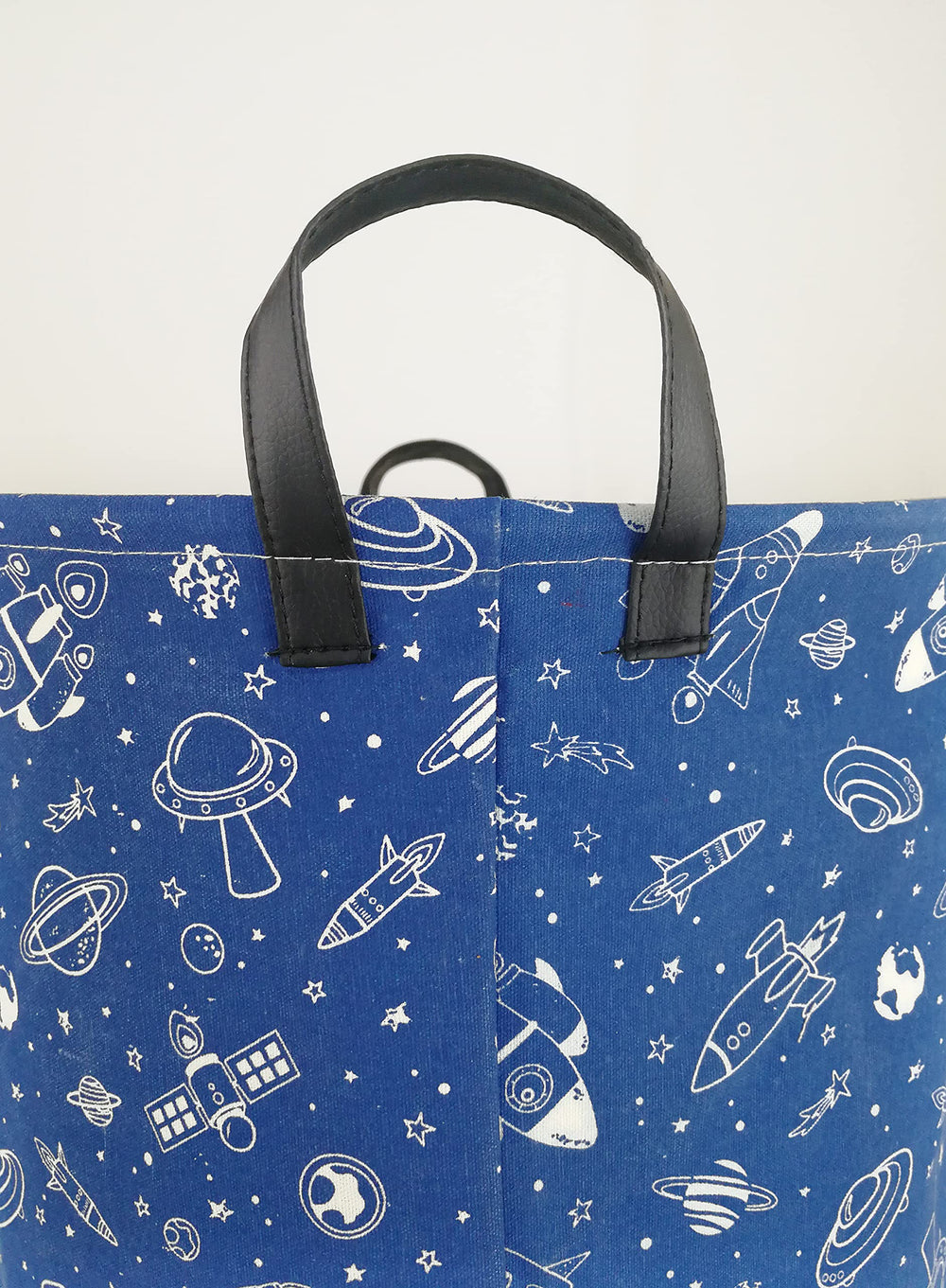 KUNRO navy spaceship basket material close up highlighting linen cotton blend and waterproof lining