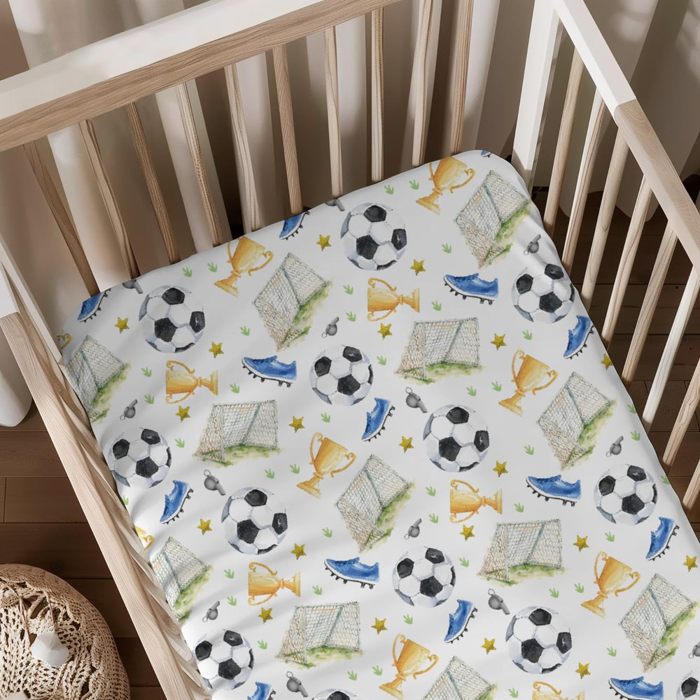 KuphiL10C crib sheet with watercolor soccer balls pattern for a playful unisex nursery