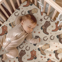 KuphiL10C pattern detail highlights playful horseshoes and stars for engaging baby visuals