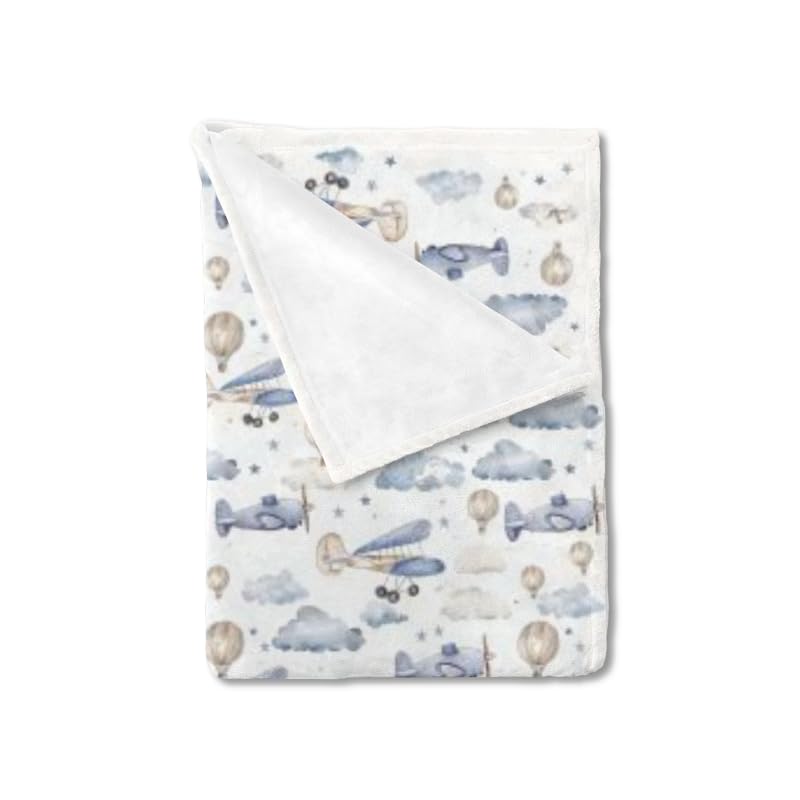 KuphiL10C plane hot air balloons blanket adds playful warmth to a cozy nursery.