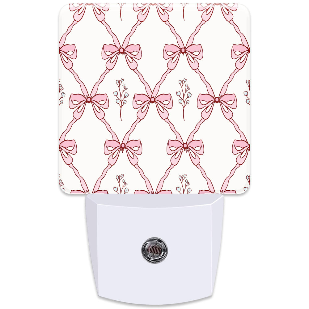KXWQTRDD pink ribbon night light, front view with warm glow for kids' rooms